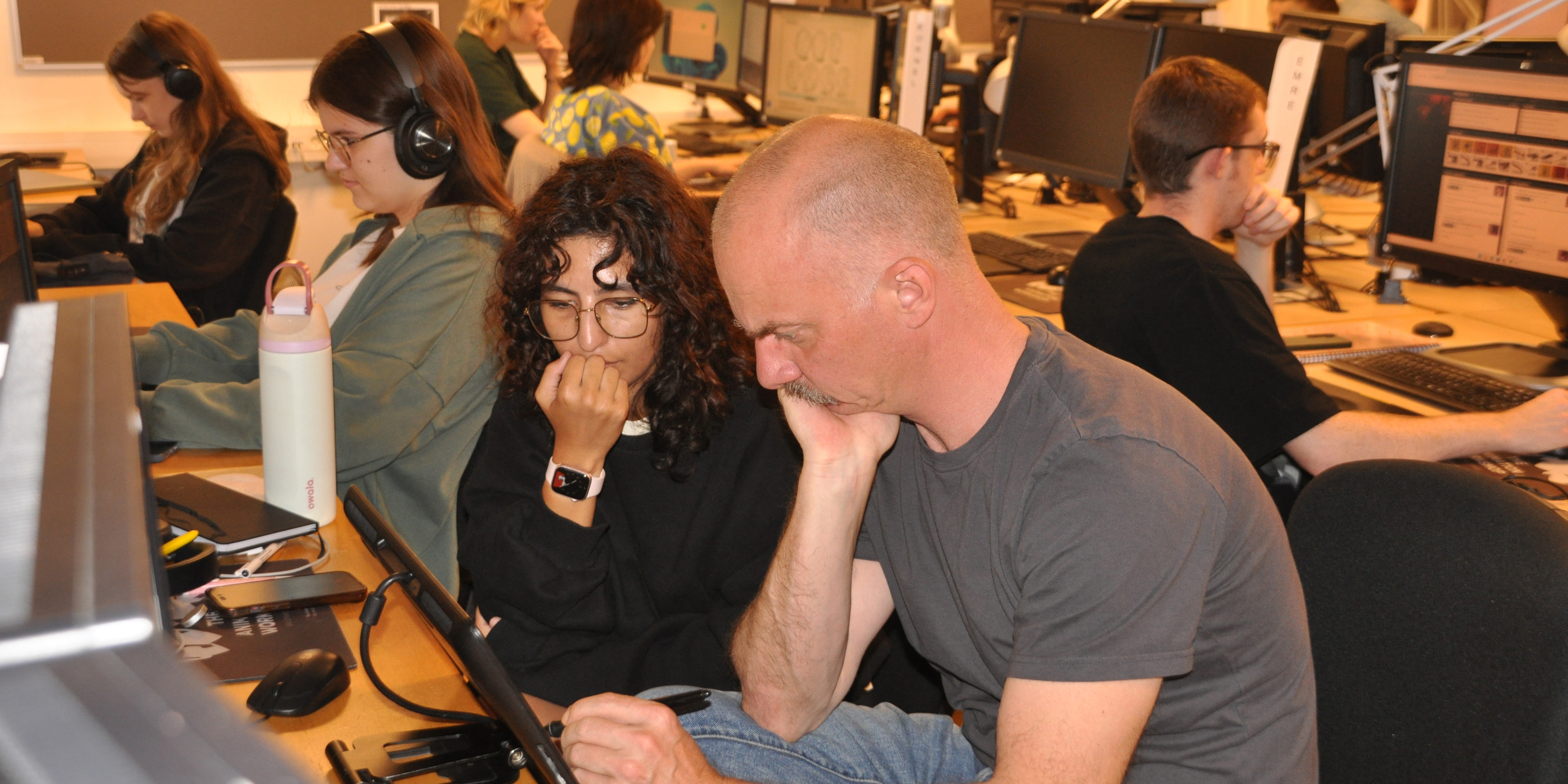 Students working on 2d animation during summer school