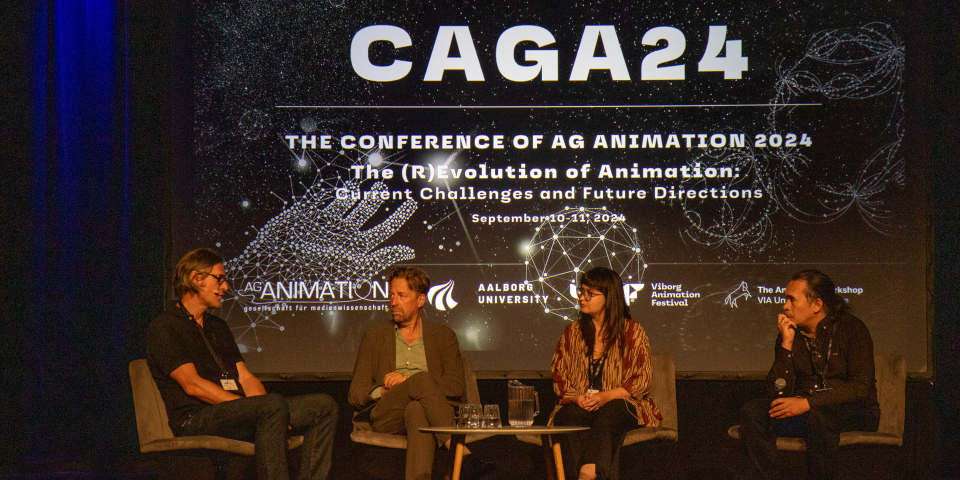 Four people speaking at CAGA24